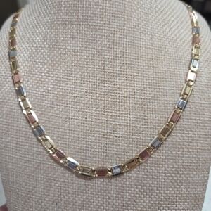 Elegant Gold, Silver, and Rose Gold Necklace